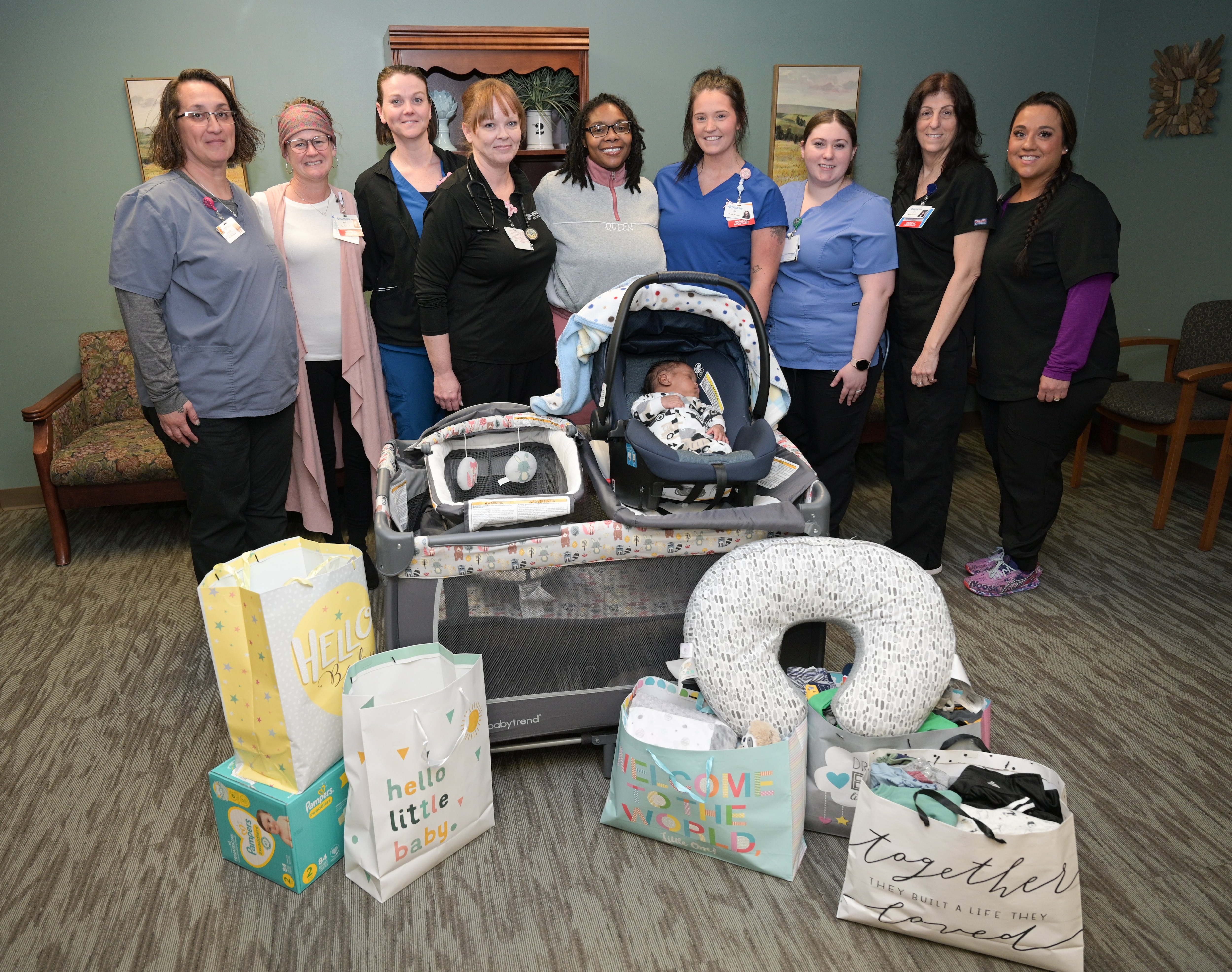 Tiana Banks, Baby Raymond, Genesis OB/GYN staff and donated baby necessities