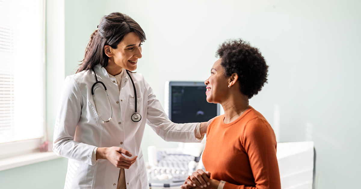 patient discussing pain levels with provider