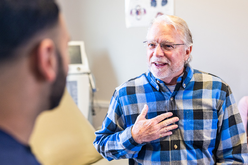 Man holding his chest